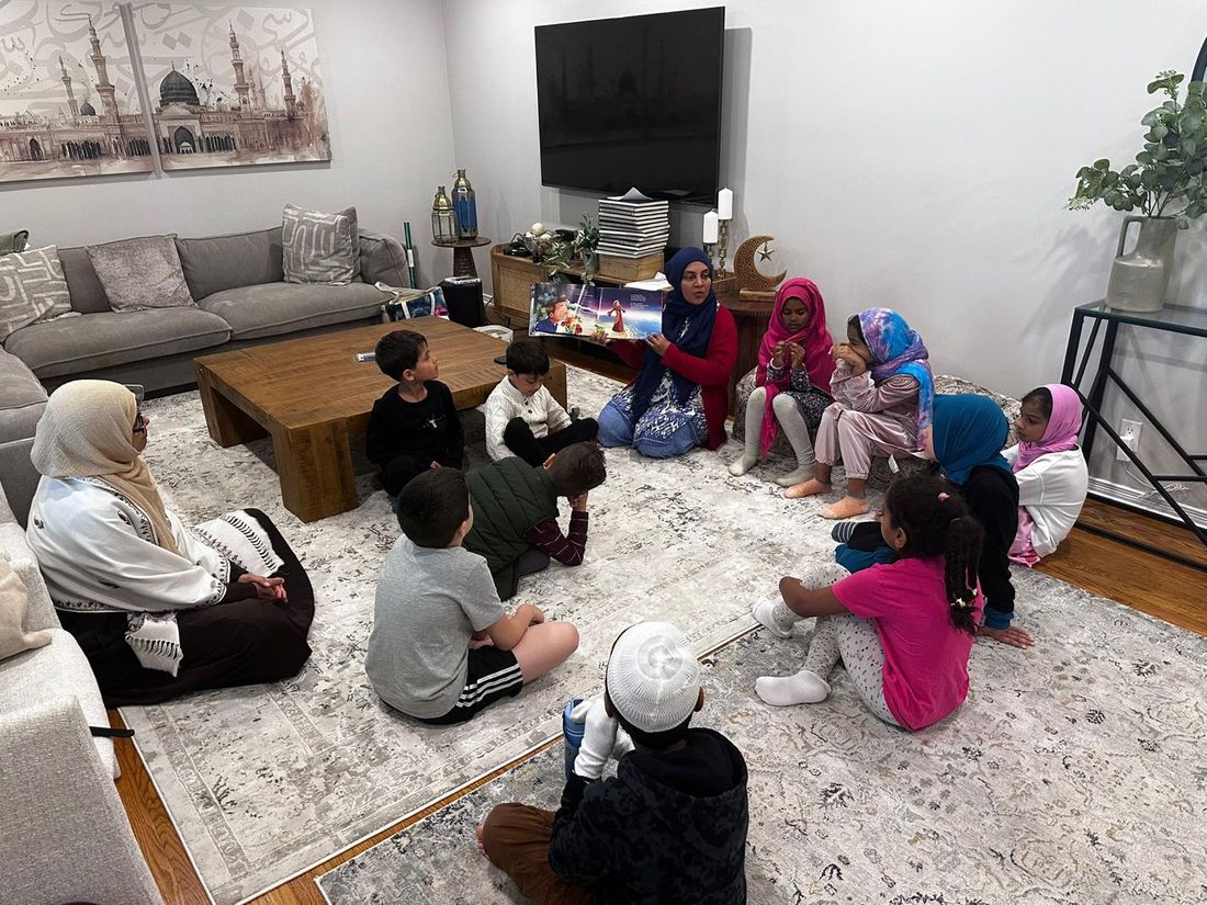 Children gathered for storytime in a learning circle
